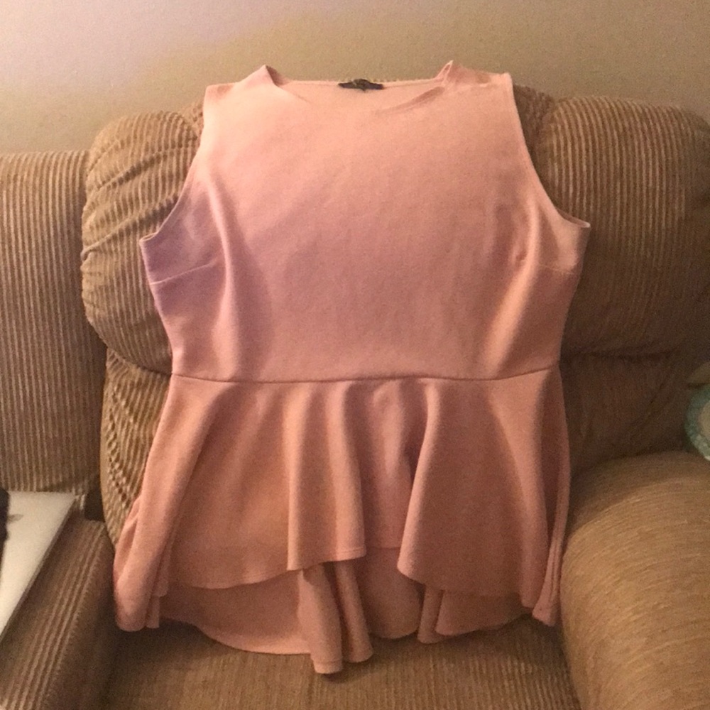 Pink blouse with a flair bottom